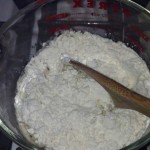 Add 1 cup of flour to the yeast mixture.